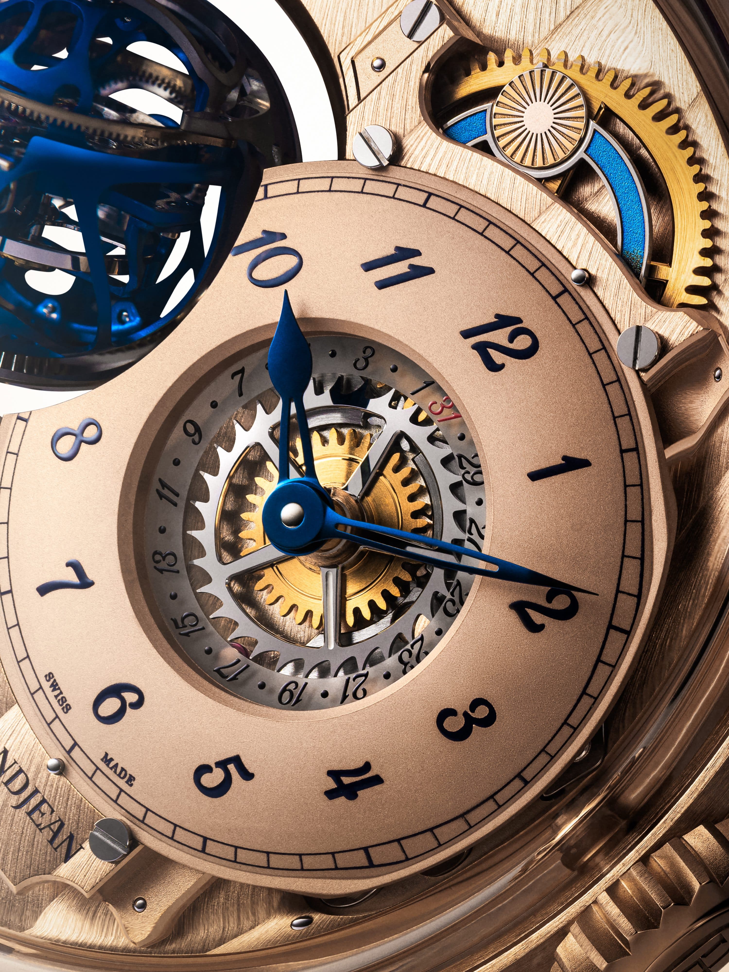 Rose gold dial with blue hour indexes