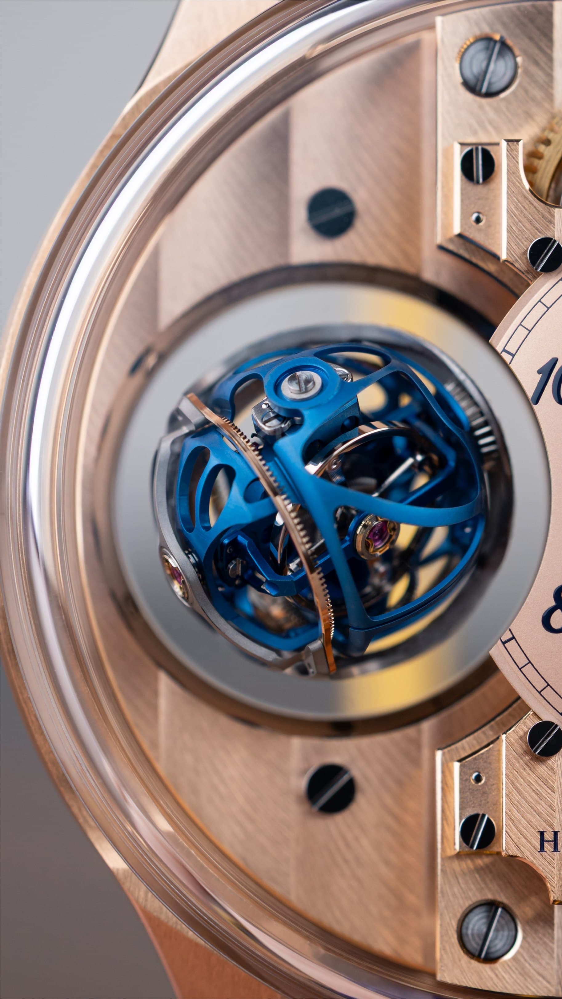 Blue-coloured triple-axis tourbillon cages