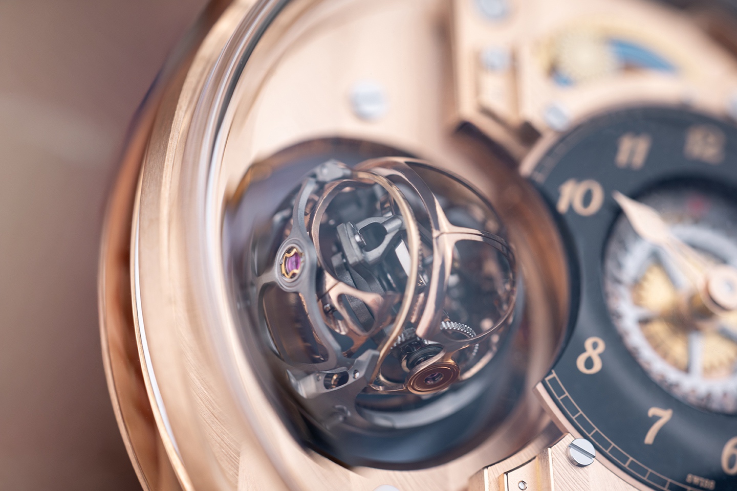 Triple-axis tourbillon with rose gold cages