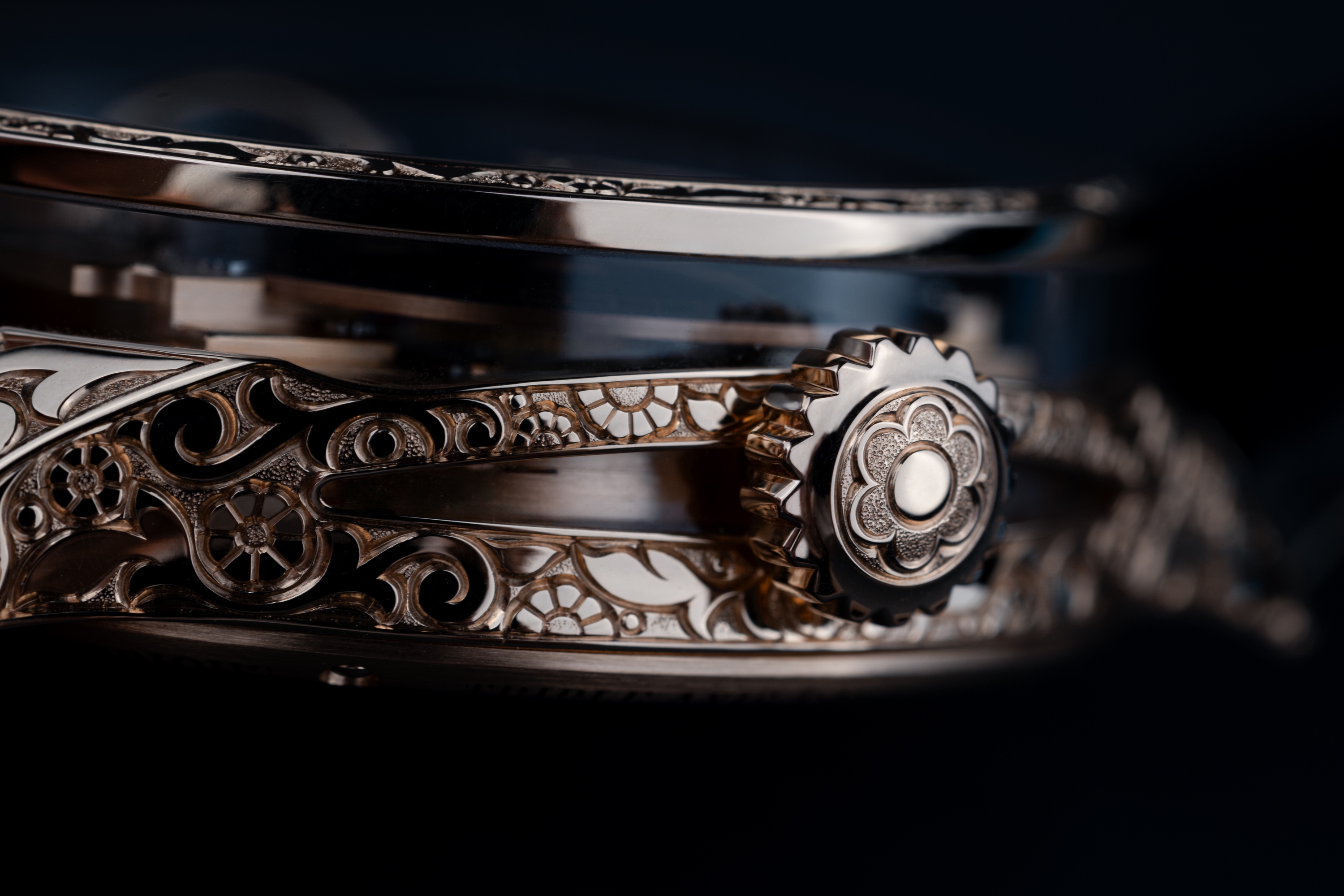 Hand-carved case engraving detail