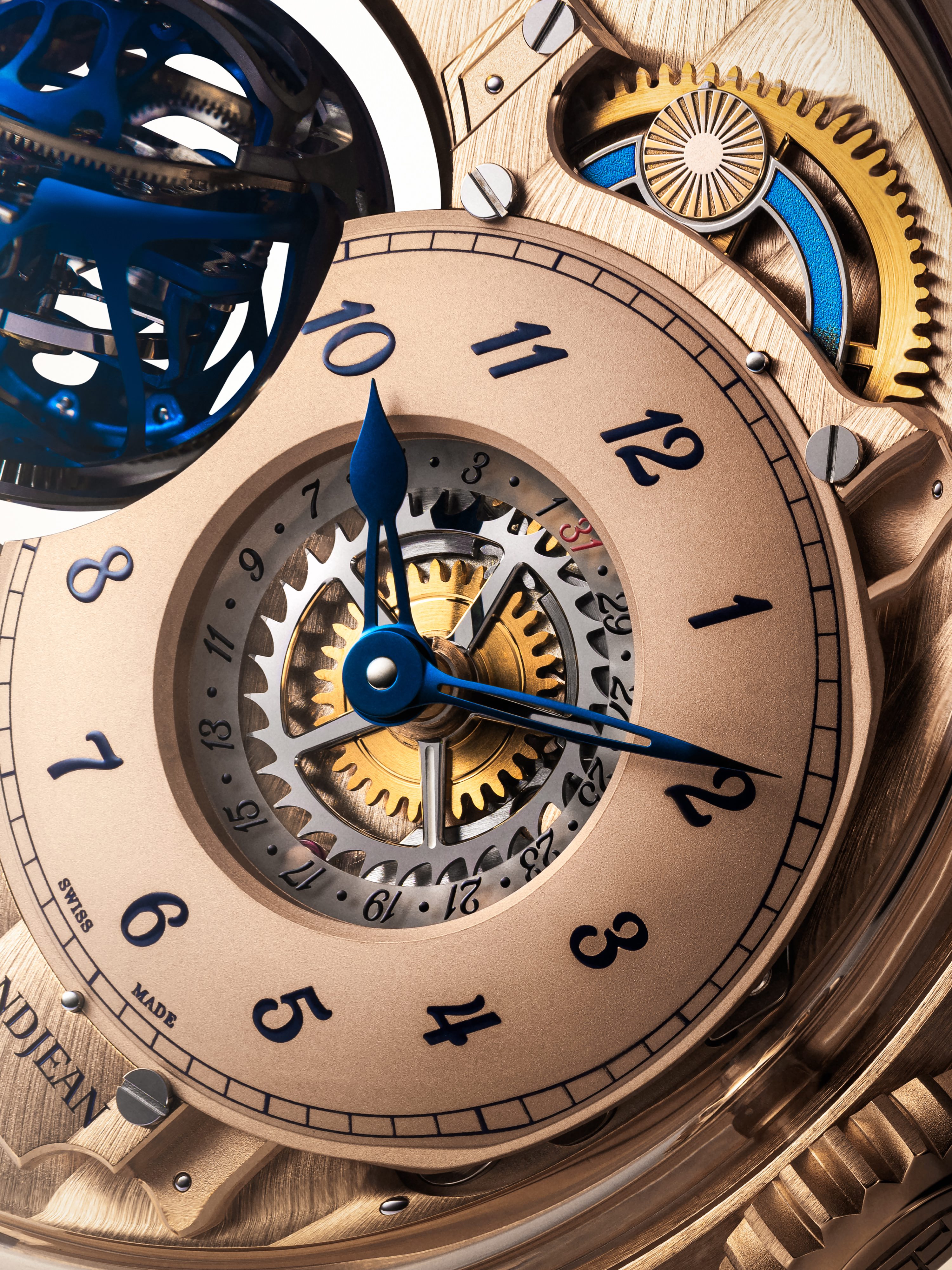 Rose gold dial, blued steel hands and blue tourbillon close-up